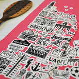 Brighton pink illustrated tea towel